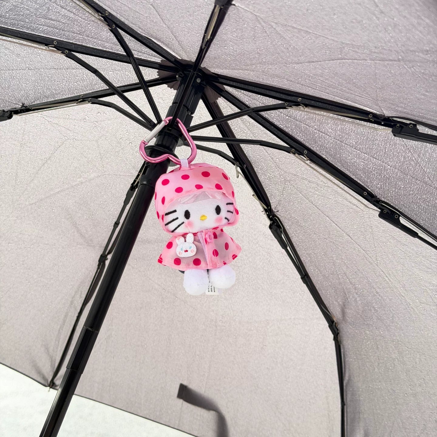 Raincoat kitty cat bag pendant cute kt plush doll key chain pendant high-end sense gift
